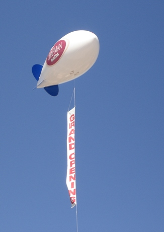 custom helium blimp with vertical banner